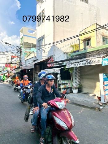 Nhà bán mặt tiền đường xóm chiếu- khu dân cư sầm uất- thích 6363774