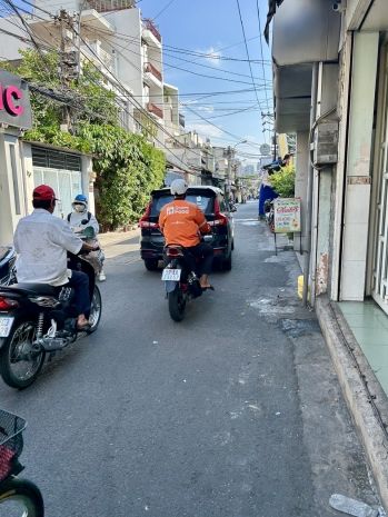 Nhà bán mặt tiền đường xóm chiếu- khu dân cư sầm uất- thích 6363776