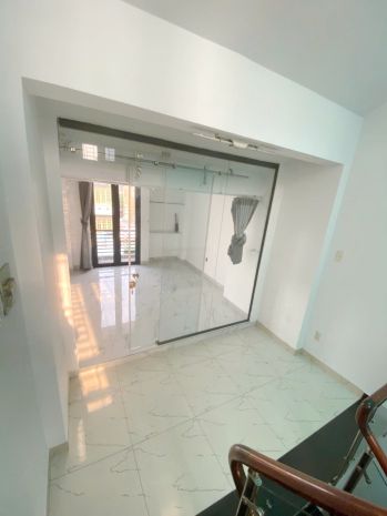 Nhà 3 tầng mặt tiền đường dã tượng p10 q8 6621037