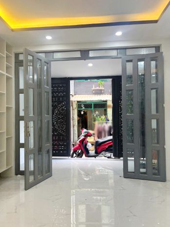 Nhà mới hxh 5m 2lầu4pn5wc số 9 âu dương lân p3q8 6642045
