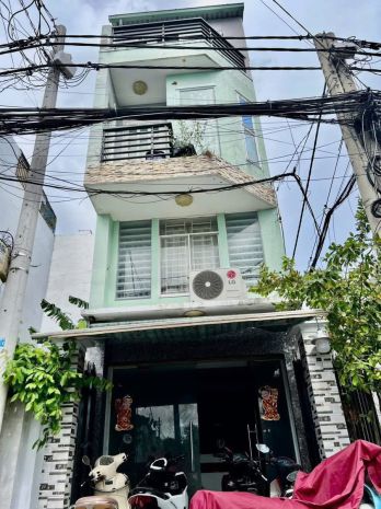 Nhà 4 tầng căn góc 2 mặt tiền  44m2, hẻm xe hơi đậu cửa. 6724213