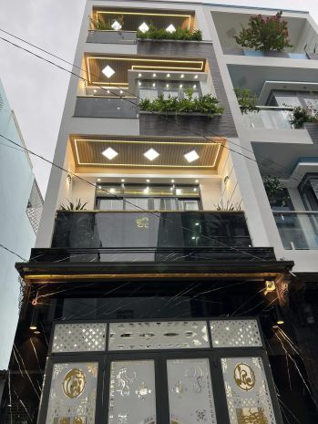 Mặt phố, gần phạm văn đồng - thang máy - kinh doanh hút lộc 6906126