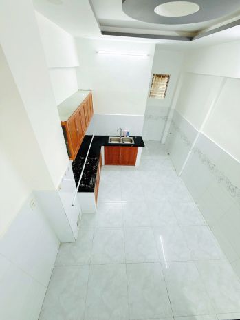 Nhà 2 tầng nở hậu hẻm 184 âu dương lân p. chánh hưng. giá 6932480