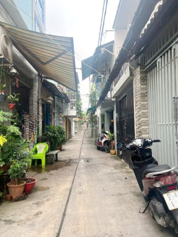 Nhà 4 tầng hẻm thông ngay chợ bùi minh trực p5q8. giá 5.5 6989030