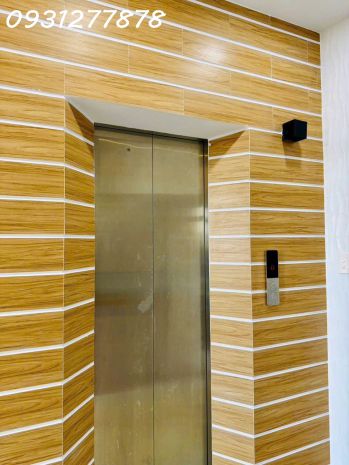 Phẩm xe hơi ngủ thang máy xịn xò trong nhà phân khúc  tren 7069576