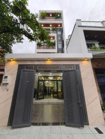 Giá 15.8 tỷ  tòa nhà 5 tầng mặt tiền kinh doanh  sát võ 7089596