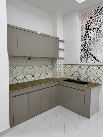 Nhà mới 4 tầng vị trí đẹp hẻm 137 âu dương lân p3q8. giá: 7154889