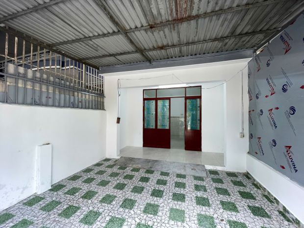 Bán nhà 2 tầng có sân đậu được 2 oto rộng rãi. vĩnh trung - 7166801