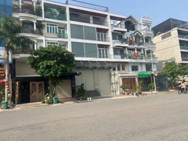 Toà nhà 1 hầm 5 lầu 9x20 mặt tiền 30m  kdc an sương, q12 7168620