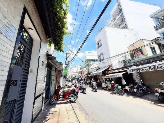 Bán nhà 2 tầng mtkd đ.xóm chiếu, quận 4 - ngang hiếm 6m*24m 7191679