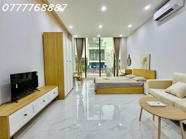 Tòa nhà đẹp sang mt lạc long quân tân bình, hầm 6 tầng dt 7202035