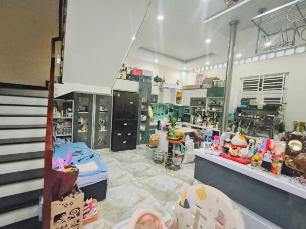 Nhà mặt tiền xe hơi 4 tầng gần chợ phú lợi 2 ngang 9m hoàn 7230617