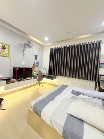 Bán nhà hxh trần thái tông ngang gần 4m 4 tầng sát mặt tiền 7255830