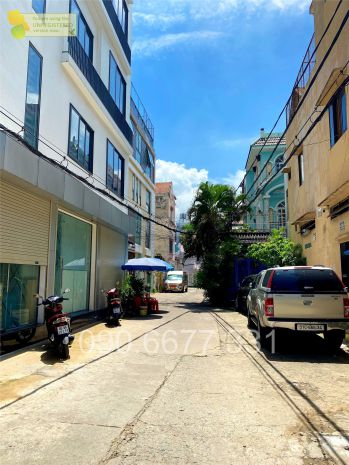 Bán nhà bình thạnh  2 mặt hẻm xe hơi  ngang 7m thông 7262236