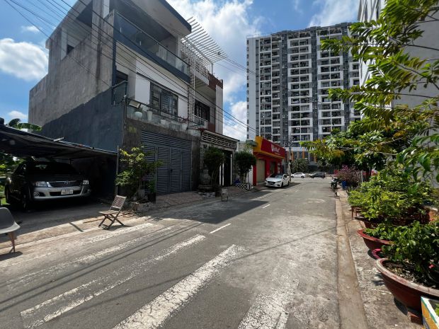 Bán đất kdc sổ hồng ,có sẵn nhà kho trên q9, 104m2 , ngang 7311423