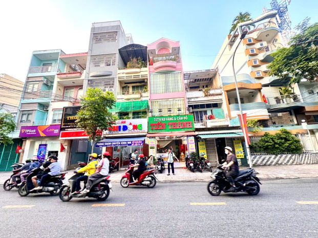 Bán nhà 6 tầng- mặt tiền đ.vinh hội, quận 4- dt 4m*25m 7328971