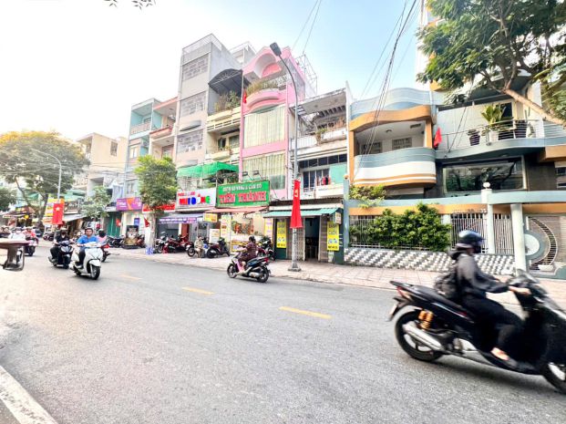 Bán nhà 6 tầng- mặt tiền đ.vinh hội, quận 4- dt 4m*25m 7328973