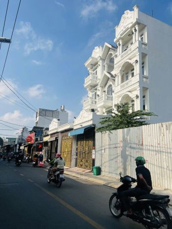 Mặt tiền hiệp thành 17  ngang 4m  xây 4 tầng  đối diện 7357827