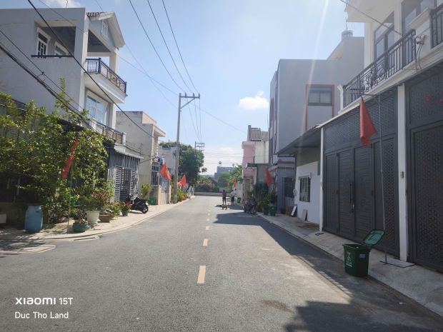 Bán lô đất đẹp đường nhựa 12m tx52 cạnh sông mát mẻ, 5x23m 7375610