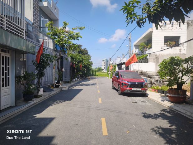 Bán lô đất đẹp đường nhựa 12m tx52 cạnh sông mát mẻ, 5x23m 7375611