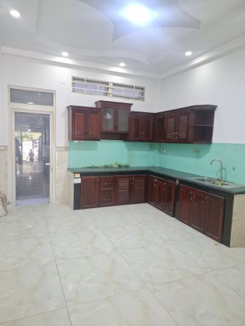 Nhà mặt tiền an dương vương gần chợ 4x26 kinh doanh 4 tầng 7425732