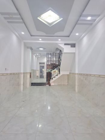 Nhà mặt tiền an dương vương gần chợ 4x26 kinh doanh 4 tầng 7425734