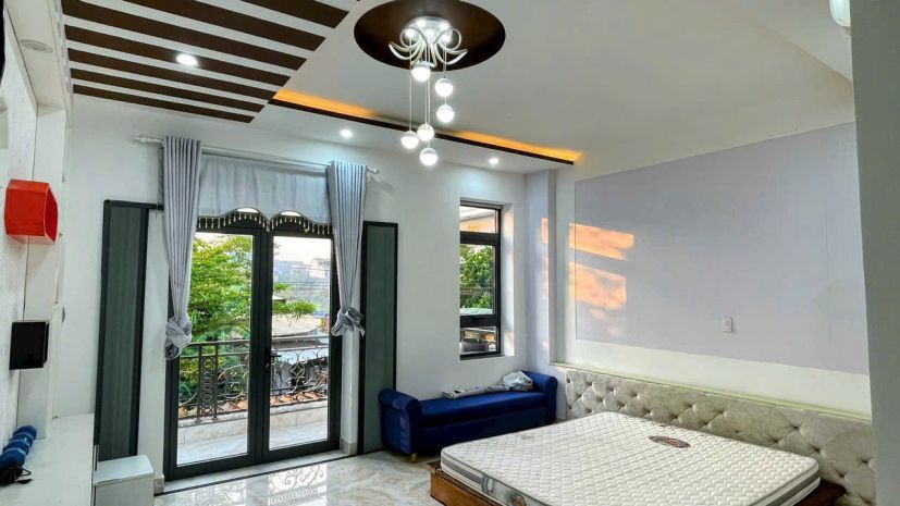 Bán nhà 4 tầng đường hoà phú 9 trục đường 7,5m thông tô 7435933