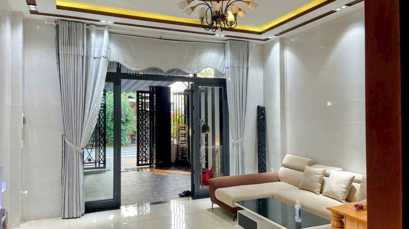 Bán nhà 4 tầng đường hoà phú 9 trục đường 7,5m thông tô 7435936