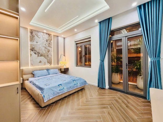 Nhà mới 100  hẻm 9m ô tô  tránh  khu vip gò vấp.  ngang 7438874