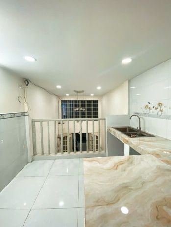 Nhà mặt tiền tôn đản quận 4,cách chợ cầu cống vài bước chân 7457529