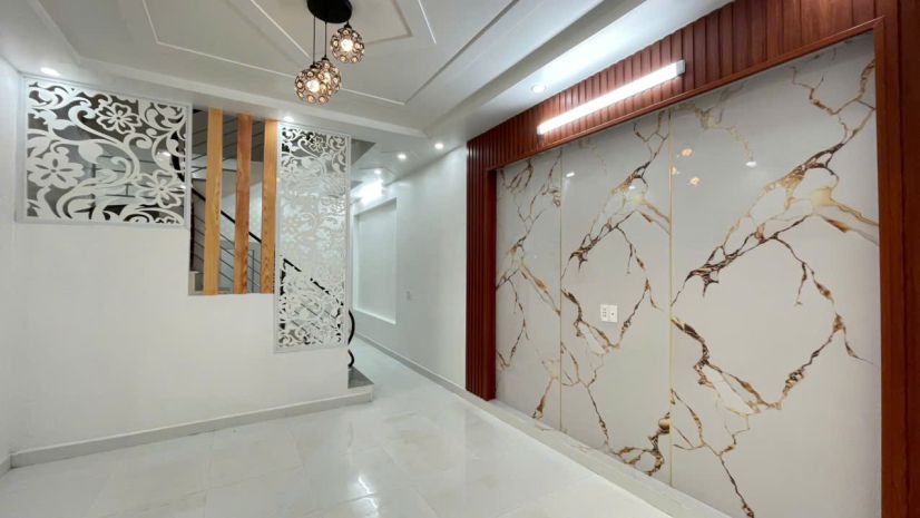 Nhà 3 tầng  ô tô đỗ cửa  gần chợ lũng đông  giá 2,35 7601290