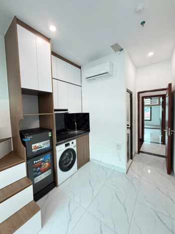 Bán tòa nhà dòng tiền 100 trth - hoàng văn thái, thanh 7641155