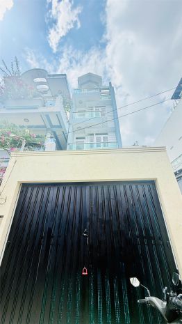 Bán nhà gần emart 2  hẻm ô tô tránh nhau  5 tầng, dt 7658929