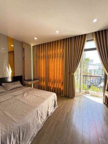 Bán nhà kiểu vila mini mặt tiền trước sau k112 trần cao vân 7674220