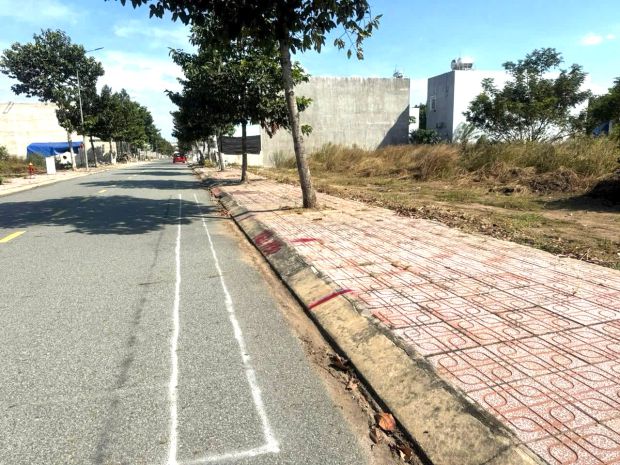 Cần bán nền 100m2 ngay trục chính kdc hội nghĩa sát vsip 3 7684441