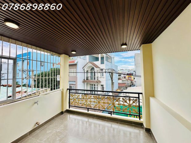 Nhà mặt tiền hẻm xe hơi 8m  502 huỳnh tấn phát  vừa ở vừa 7689309