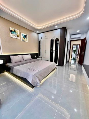 Bán nhà mt đường số 22 thới an, q12 - 6 tầng có thang máy - 7718539