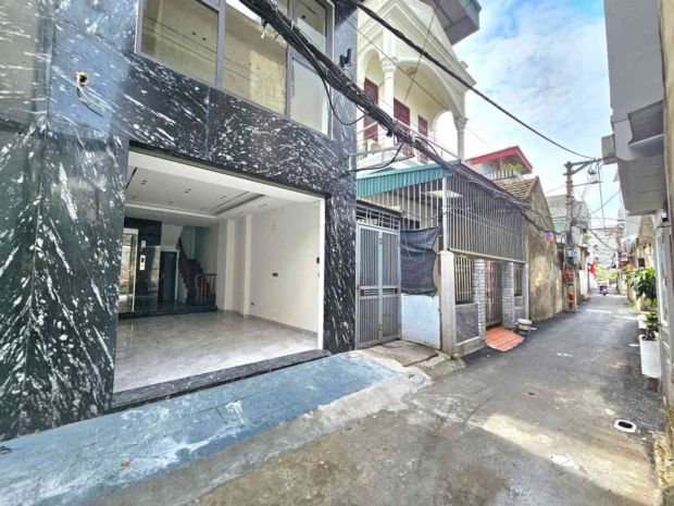 Bán nhà long biên 9 tỷ 40m gara,thang máy,nhà mới 7725567