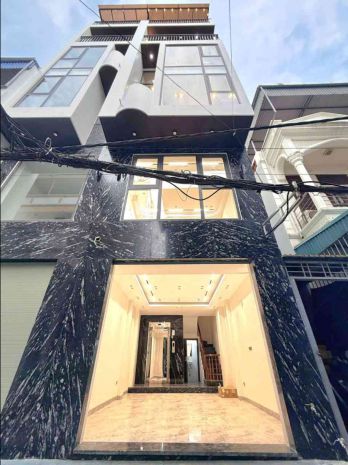 Bán nhà long biên 9 tỷ 40m gara,thang máy,nhà mới 7725568