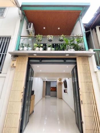 Xe hơi đỗ cửa  điện biên phủ , khu bàn cờ  nhà mới. 7727362
