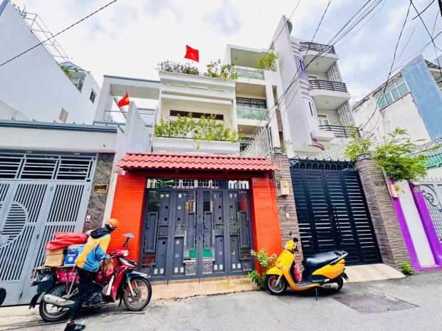 Quận 4: chính chủ  bán nhà 3 tầng mặt tiền hxh 8m hoàng 7729413