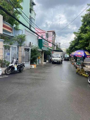 Nhà mặt tiền đường xe hơi né nhau - đông hưng thuận 23- 7736015
