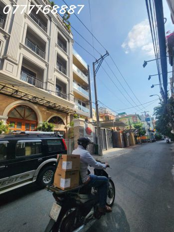Tòa nhà hầm + 7 tầng - gần vạn hạnh mall quận 10 - giảm còn 7770906