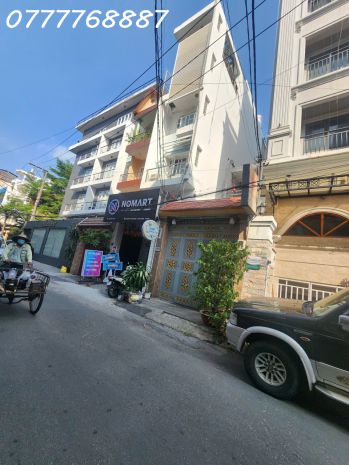 Tòa nhà hầm + 7 tầng - gần vạn hạnh mall quận 10 - giảm còn 7770907