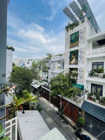 Đối diện sân golf tân sơn nhất - 74m² - 4 tầng - hẻm xe hơi 7773130