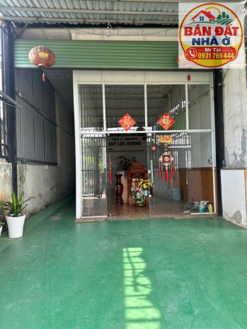 Chính chủ bán đất và nhà cấp 4 mặt tiền đt743c 7775712