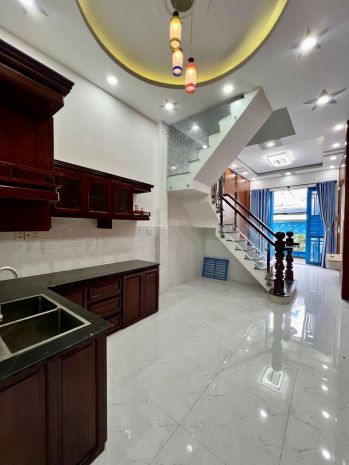 Bán nhà ngay hẻm xe hơi phú định quận 8  4 tầng - 44m2 7783861