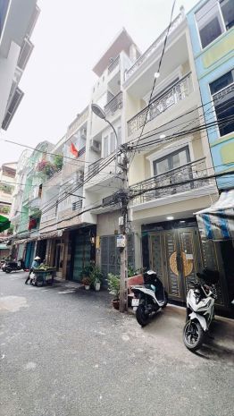 Bán nhà 4 tầng,diện tích sử dụng 80m2, 3pn, p3, q.4, giá 7795192