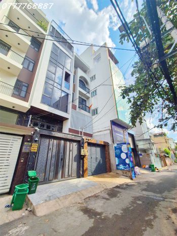 Ngộp bank bán gấp tòa nhà 8 tầng bùi đình túy hxh 6m - 7801919